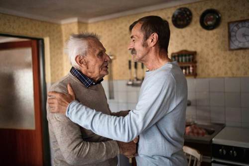 Two people holding each other

AI-generated content may be incorrect.